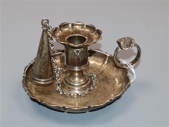 A George III silver miniature chamberstick with snuffer, London 1829, makers E J & W Barnard, approx. 10cm width.